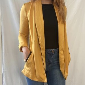 Gold smoking jacket with black piping